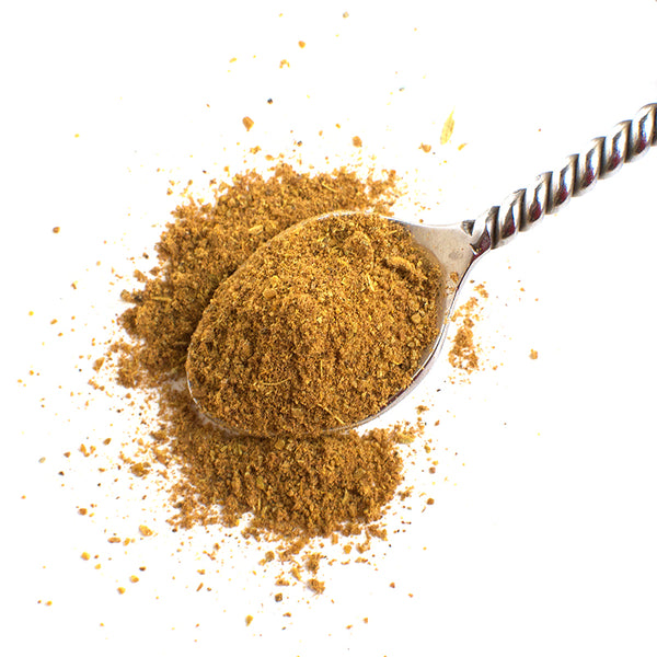 Aromatic Spice Blends Persian Advieh spice blend closeup on spoon