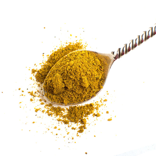 Aromatic Spice Blends Hawaij spice blend closeup on spoon