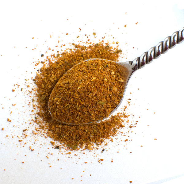 Aromatic Spice Blends Moorish BBQ spice blend closeup on spoon