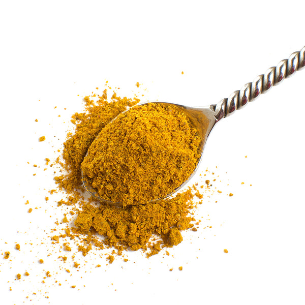  Aromatic Spice Blends Mild Curry spice blend closeup on spoon