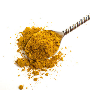  Aromatic Spice Blends Szechuan Curry Curry spice blend closeup on spoon