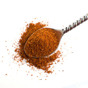  Aromatic Spice Blends Hot Tunisian Harissa spice blend closeup on spoon